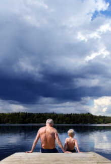 Father and son on wharf.